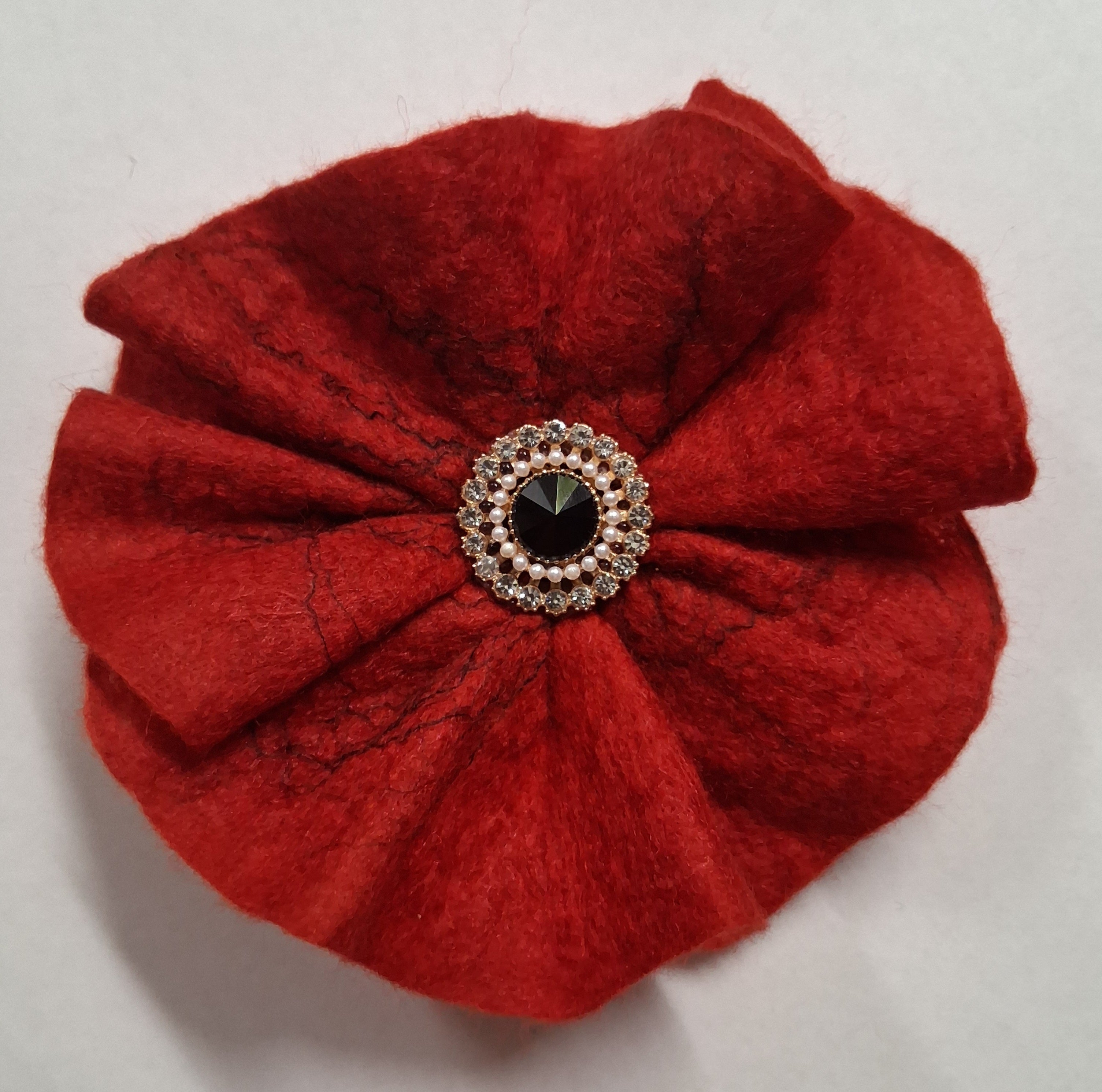 Wet felted flower brooch