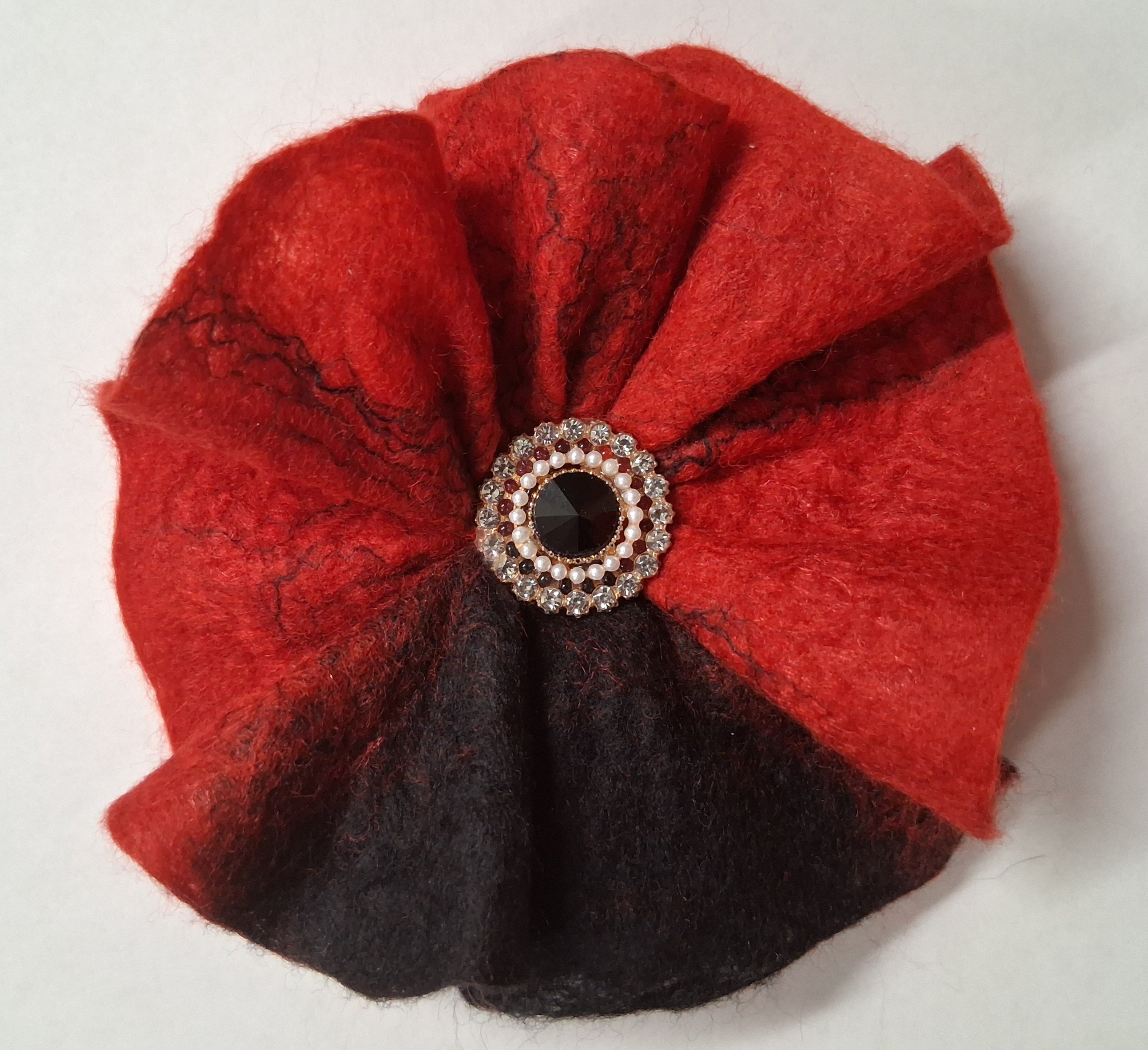 Wet felted flower brooch